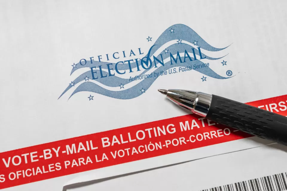 Close-up of vote-by-mail ballot with pen